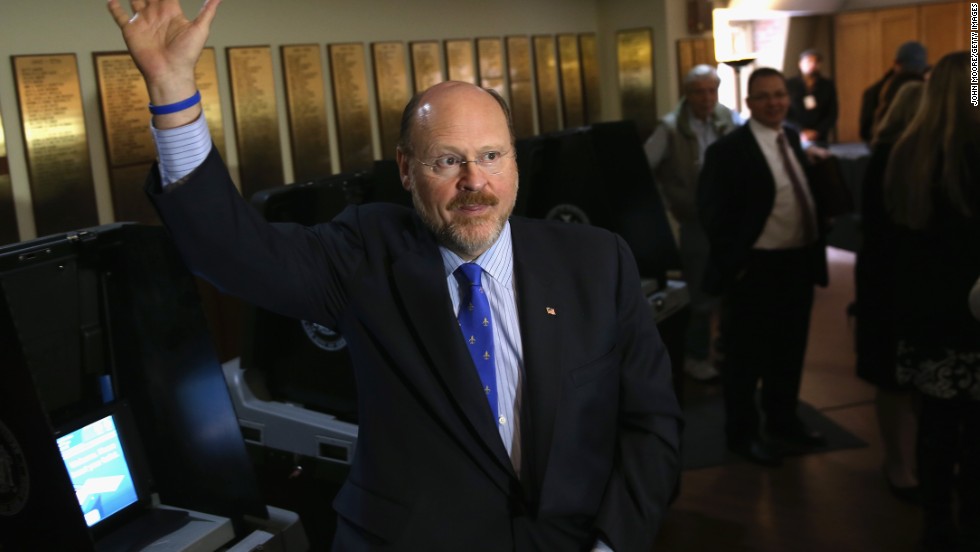 Lhota waves after casting his vote in Brooklyn. Lhota was deputy mayor under Rudy Giuliani and former head of the New York City transit authority. 