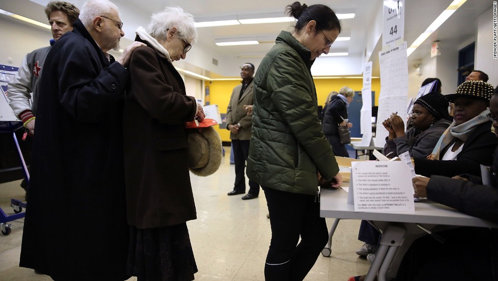 People stand in line to vote in Brooklyn.