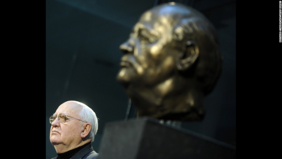 Gorbachev next to a bust of himself created by French artist Serge Mangin after unveiling it to guests in Berlin in 2009.