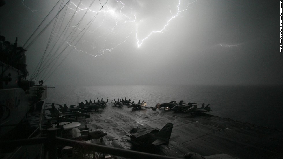 Lightning strikes over the flight deck of the USS John C. Stennis, another Nimitz-class aircraft carrier, as the ship moves through the Persian Gulf in 2007. All of the Navy&#39;s 10 active aircraft carriers are from the Nimitz class, which started in 1975 with the commission of the USS Nimitz.