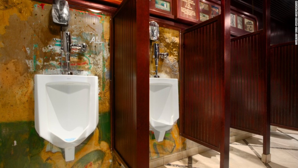 A men&#39;s rooms at this Las Vegas casino has been home to a portion of the Berlin Wall for about 20 years. Three urinals are mounted onto the graffiti-bearing concrete slab. The wall itself is protected by glass.