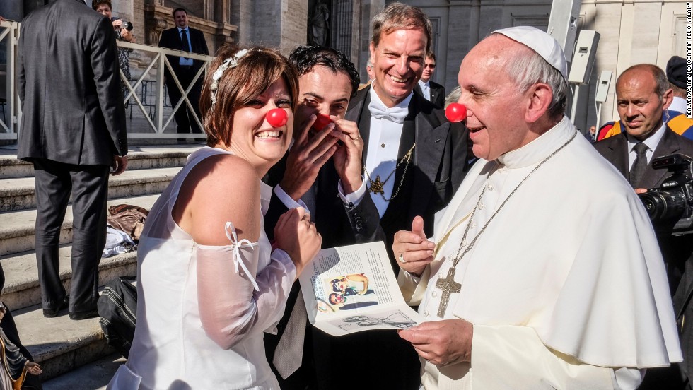Pope Francis jokes with members of the Rainbow Association, which uses clown therapy in hospitals, nursing homes and orphanages. Many Catholics saw this image as the joyful flip side of Francis&#39; embrace of the disfigured man. 