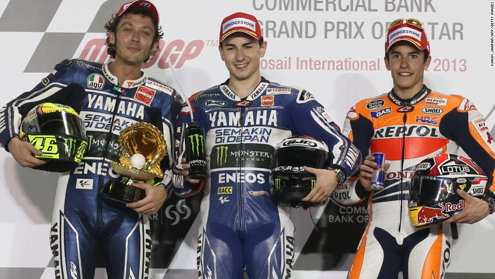 Marquez (right) made an immediate impression in MotoGP, finishing third in the opening race of the season. Jorge Lorenzo (center) won the race with Valentino Rossi finishing second. 