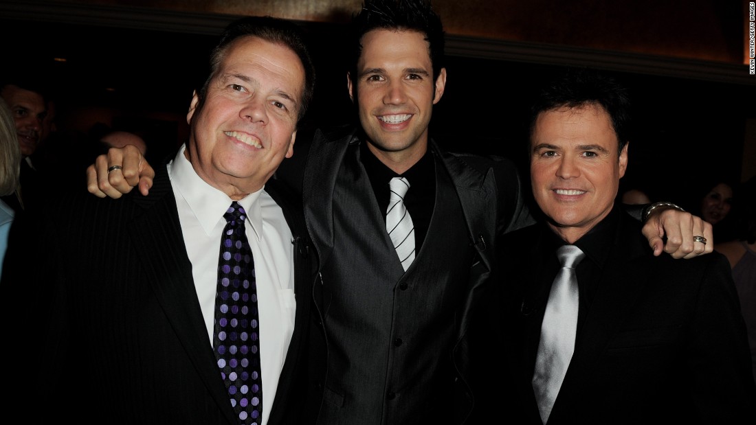 Singer Alan Osmond, left, and his son David Osmond both live with multiple sclerosis. 