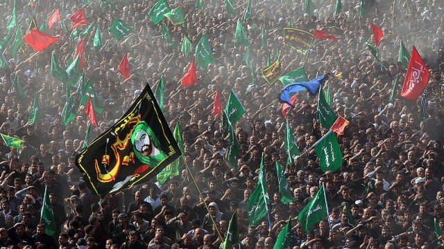 Thousands of Shiite Muslims take part in a ritual ceremony of Ashura in Karbala, Iraq, in 2013. 