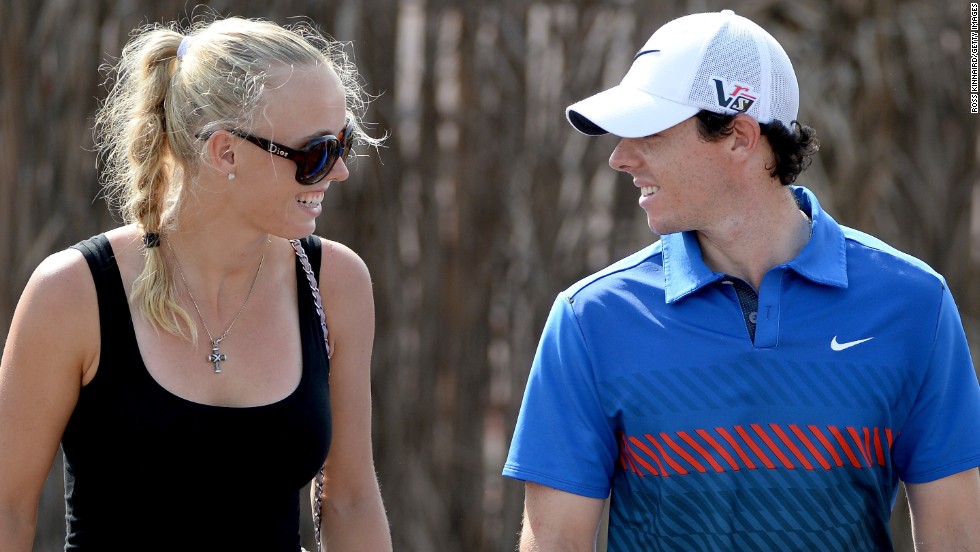 Despite rumors the pair had split, two-time major winner Rory McIlroy and former tennis World No. 1 Caroline Wozniacki were pictured together at the Dubai World Tour Championship. &quot;It was nice,&quot; McIlroy was quoted as saying by The Guardian newspaper of Wozniacki&#39;s arrival. &quot;She started her preseason a couple of days ago and was on court this morning at seven o&#39;clock. It&#39;s good to have her here.&quot;