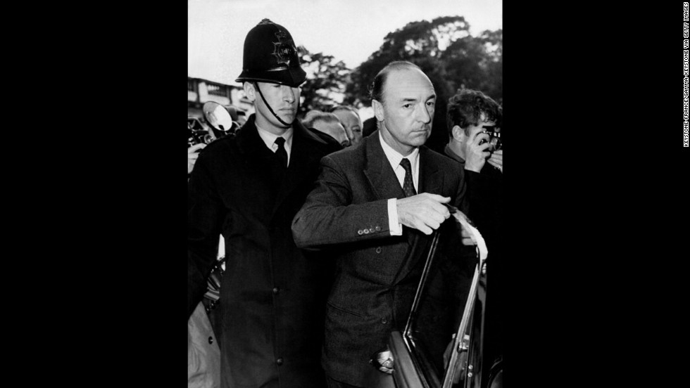 The former British War Minister John Profumo returns to London after 14 days of absence on June 18, 1963. He resigned as British state secretary for war on June 5, after admitting he had lied in denying any &quot;impropriety&quot; with 21-year-old Christine Keeler. Profumo simultaneously resigned his seat in the House of Commons.