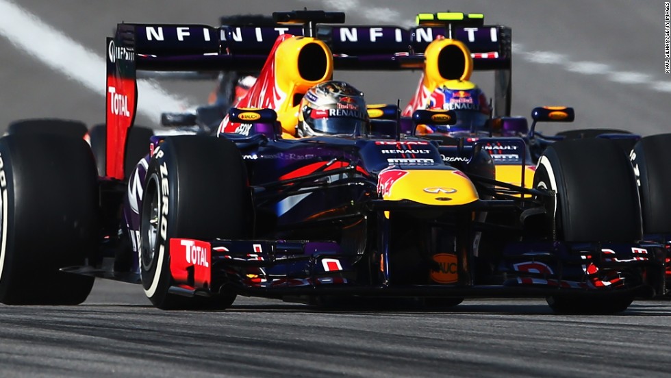Red Bull teammates Vettel and Mark Webber are wheel to wheel at the start of the United States Grand Prix.