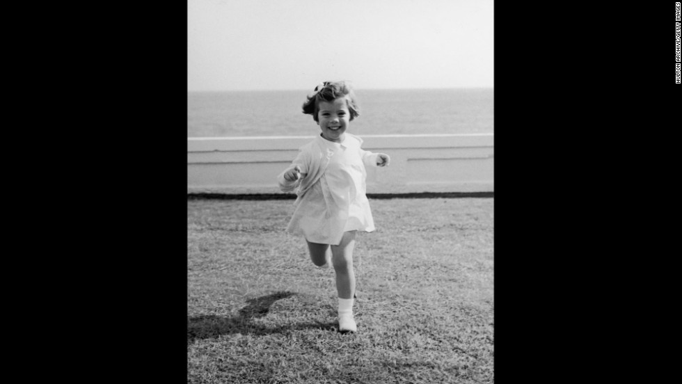 Caroline runs around during a family vacation in Palm Beach, Florida, in 1961.