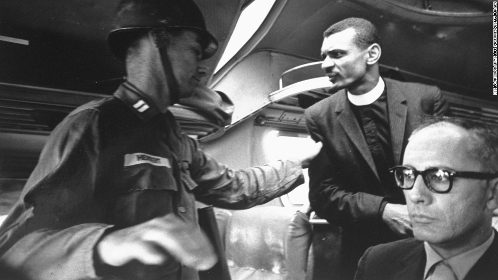 Cordy Tindell &quot;CT&quot; Vivian talks to an officer during one of the Freedom Rides from Montgomery, Alabama, to Jackson, Mississippi in 1961.