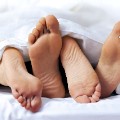 sex couple feet bed