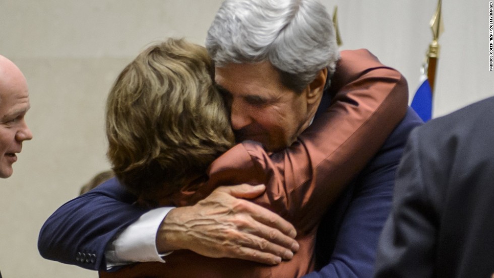 EU foreign policy chief Catherine Ashton and U.S. Secretary of State John Kerry embrace after the statement.