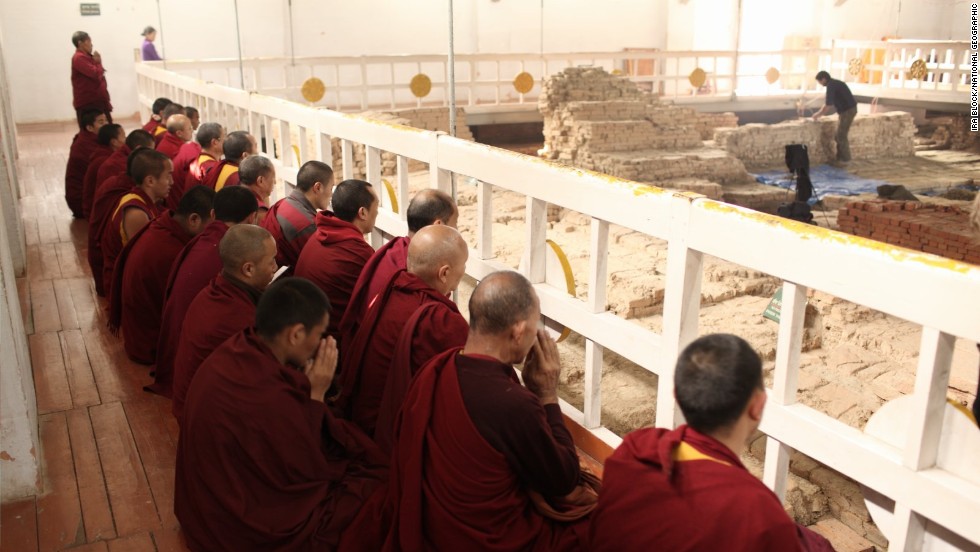 Monks chant within the Maya Devi Temple, which enshrines the Buddha&#39;s birthplace, at Lumbini in Nepal. 
