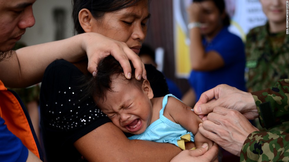 A baby receives a measles vaccine in Tacloban, Leyte province, on Wednesday, November 27. Haiyan, one of the strongest storms in history, has affected 4.3 million people in the Philippines, and many of them rely on emergency relief for food and water. &lt;a href=&quot;http://www.cnn.com/SPECIALS/impact.your.world/&quot;&gt;See how you can help.&lt;/a&gt;