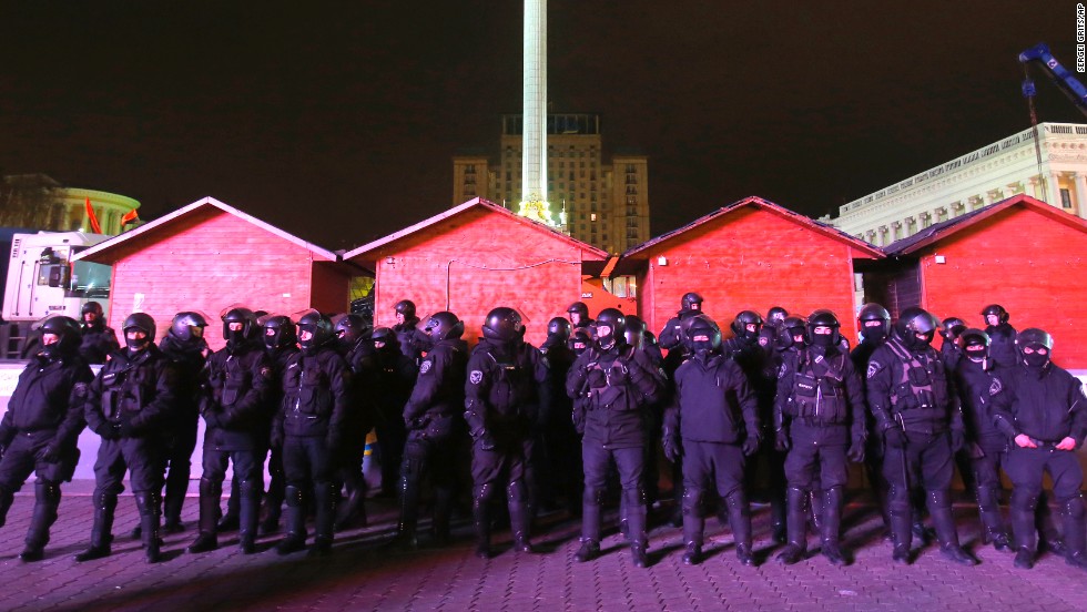 Police officers guard Independence Square on November 30 after dispersing a rally.