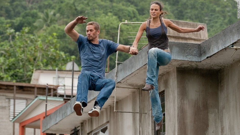 Walker and Jordana Brewster -- who played his love interest, Mia, in the films -- in &quot;Fast 5.&quot;