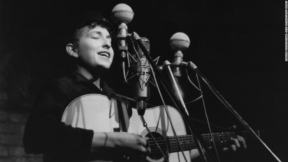 Dylan performs in 1961 at The Bitter End club in New York City. His first album, &quot;Bob Dylan,&quot; debuted in 1962 and consisted mostly of old folk songs.