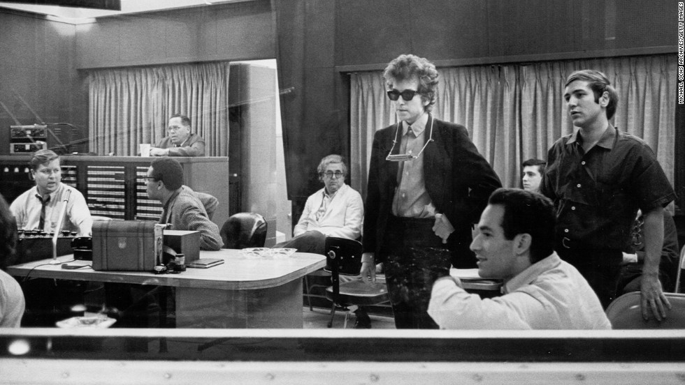 Dylan listens to recordings of his album &quot;Highway 61 Revisited&quot; in 1965. It contained &quot;Like a Rolling Stone,&quot; which went to No. 2 on U.S. charts.