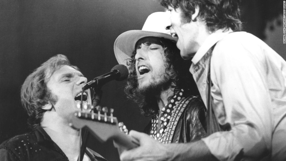 Dylan performs with Robbie Robertson of The Band, right, and Van Morrison at The Band&#39;s farewell concert in 1976.