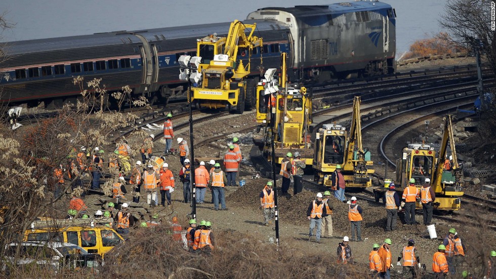 Repair efforts are under way Tuesday, December 3, at the site of a recent train derailment in the Bronx. At least four people were killed and more than 60 people were injured after a Metro-North passenger train derailed Sunday, December 1, about 10 miles north of Manhattan&#39;s Grand Central Terminal.