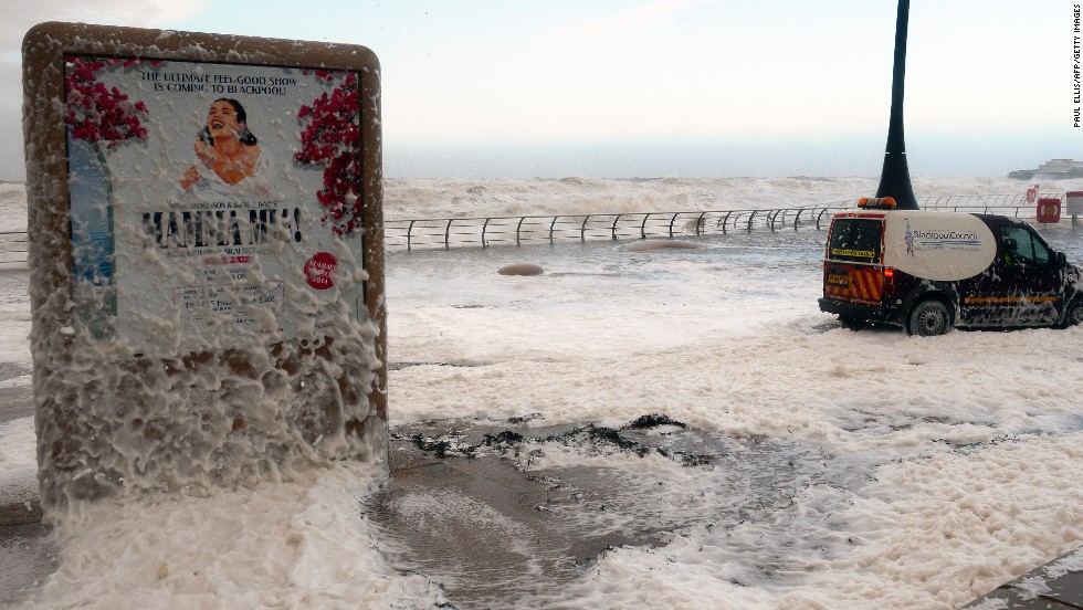 The tide turns to froth December 5 on the Blackpool promenade.