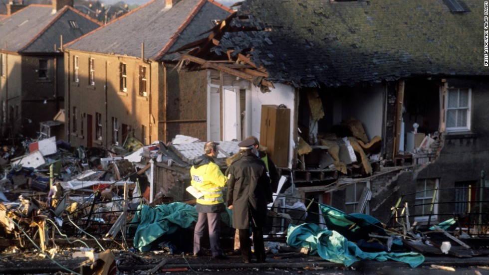 Investigators confer at the crash site two days after the tragedy. In July 1990, the British Civil Aviation Authority&#39;s Air Investigation Branch officially reported that an explosive device caused the crash.