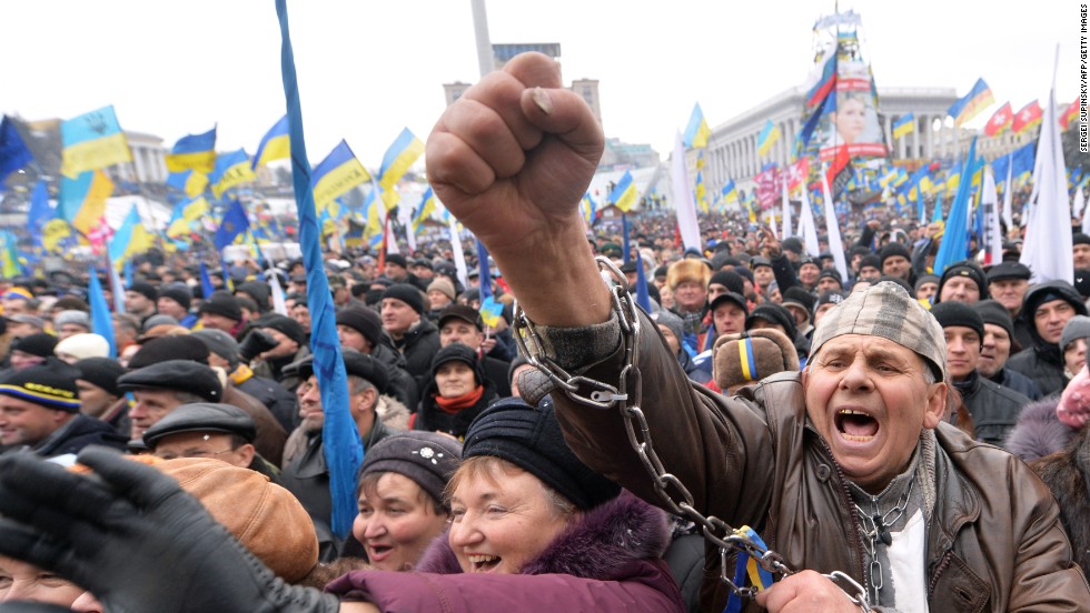 Demonstrators shout slogans during the mass rally on December 8.