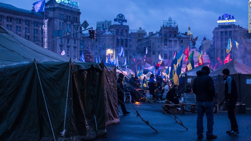 Anti-government protesters camp in Independence Square early in the morning on December 8.