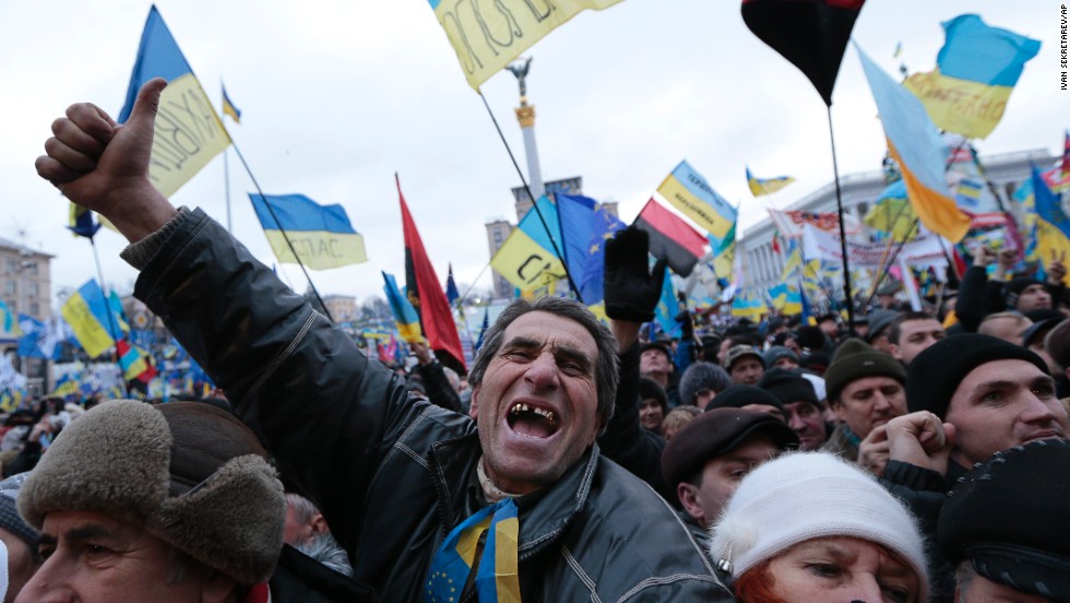 Pro-EU activists shout slogans during the rally in Independence Square on December 8.