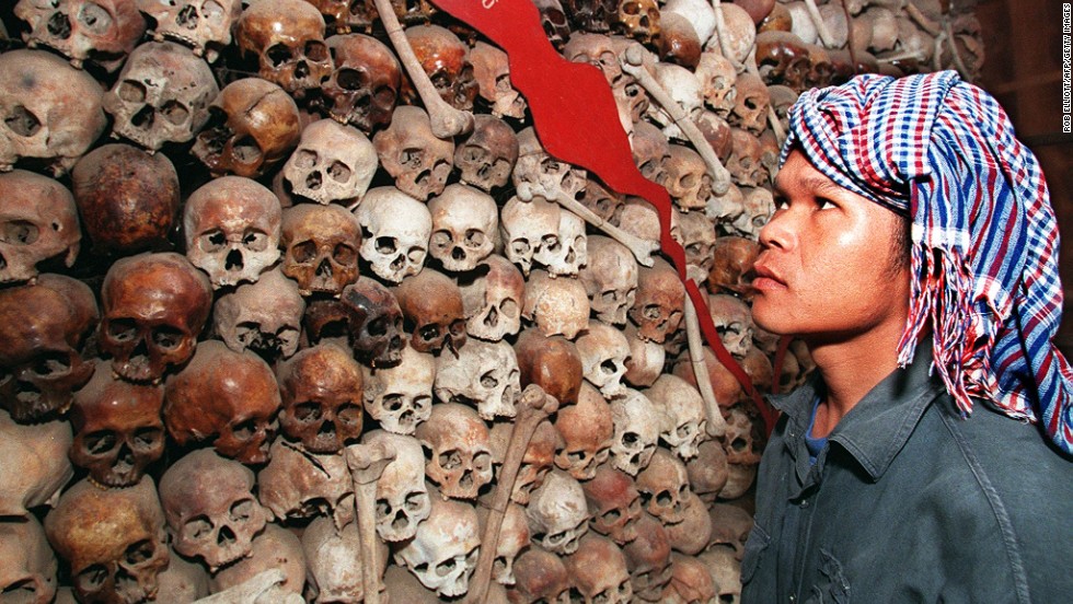 Cambodian citizen Sam Vishna looks at a collection of skulls that make up a map of Cambodia at Tuol Sleng Prison Museum in Phnom Penh in 1998.