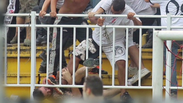 Fighting erupts in football stands