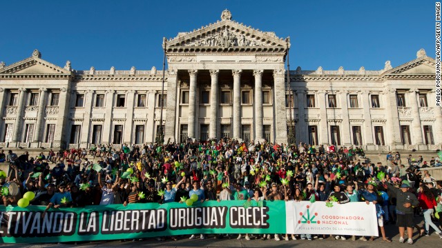 Supporters of legalizing marijuana demonstrate outside Uruguay&#39;s Senate.