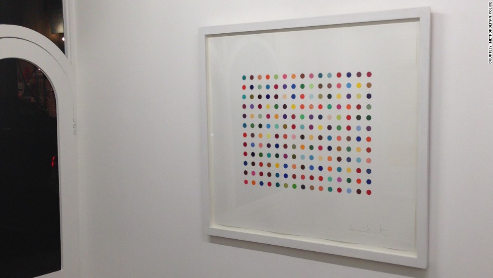 Two artworks by Damien Hirst have been stolen from a London Gallery. &quot;Pyronin Y&quot;, seen hanging in the Exhibitionist Gallery before the theft on December 9, 2013, is worth £15,000 ($24,565).