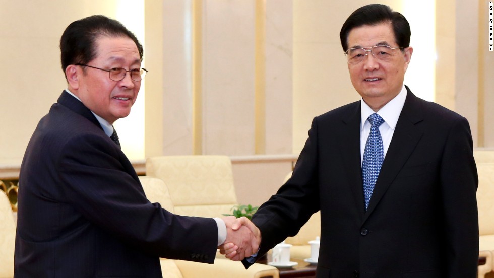 Chinese President Hu Jintao, right, greets Jang in Beijing on August 17, 2012. Jang met China&#39;s President and Premier in an effort to improve the relations between the two countries after Kim Jong Un irked Beijing with a rocket launch soon after taking power.