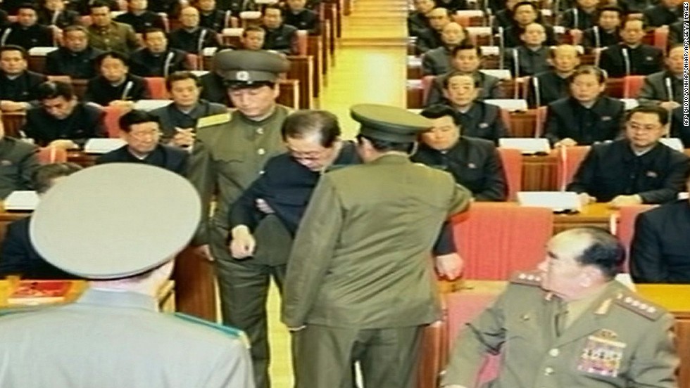 In an image taken from footage shown by North Korea&#39;s KCTV and released by South Korea&#39;s Yonhap news agency on December 9, 2013,  Jang Song-Thaek is reportedly being dragged away from his chair by two police officials during a meeting in Pyongyang. North Korea confirmed on December 9 that the powerful uncle of Kim Jong-Un, the nation&#39;s leader, had been removed. New reports from North Korea say that Jang has been executed. 