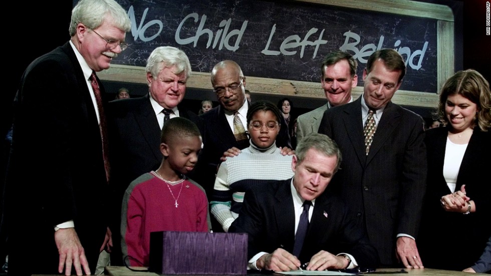 President George W. Bush signs into law the federal education bill No Child Left Behind at a high school in Hamilton, Ohio, in 2002. The law offered the promise of improved schools for the nation&#39;s poor and minority children and better-prepared students in a competitive world. Boehner, second from right, backed the bill.