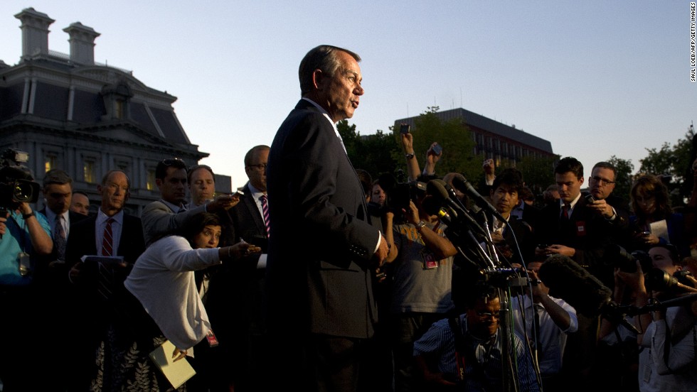 Boehner speaks to the media after a meeting with President Obama at the White House in October 2013, the second day of the federal government&#39;s recent shutdown. The White House squared off with Republican rivals in Congress over how to fund federal agencies, many of which were forced to close, leaving a fragile economy at risk. 