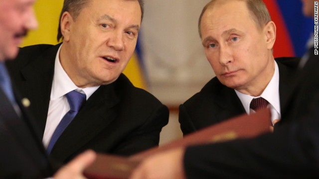 Russian President Vladimir Putin, right, and then-Ukrainian President Viktor Yanukovych in Moscow in 2013. 