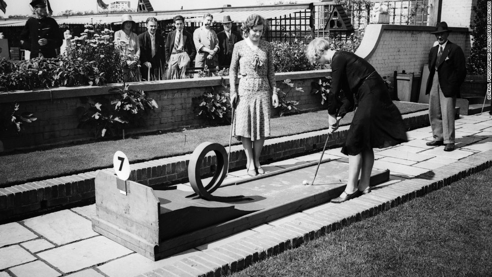 These women are seen playing in 1930, but minigolf dates back to 1867 -- when the Royal and Ancient Golf Club sought to deter females from playing the &quot;unladylike&quot; full version of the game. 