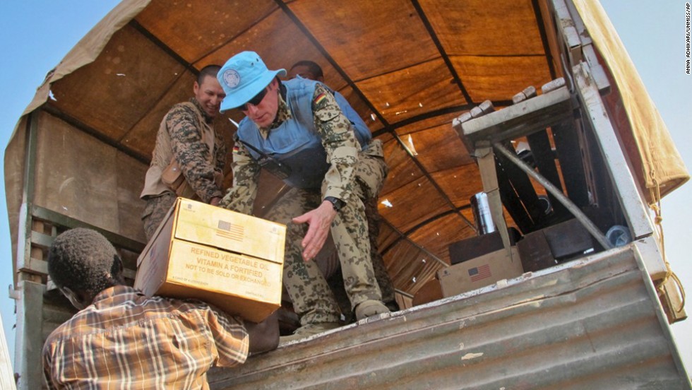 The World Food Programme distributes food for displaced people at a U.N. compound in Bentiu, the capital of the oil-producing Unity state, on December 22. 