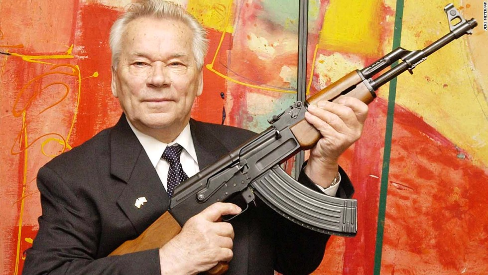 Russian weapons designer Mikhail Kalashnikov presents his legendary assault rifle, the AK-47, to the media while opening an exhibition of his work at a weapons museum in Suhl, Germany, in 2002. Kalashnikov died on December 23 at the age of 94. Click through to see where else in the world the AK-47 has appeared.
