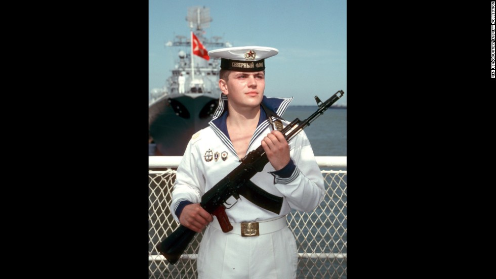 A Russian sailor stands guard with an AK-47 in Moscow during a visit from then-U.S. President Ronald Reagan in 1988.