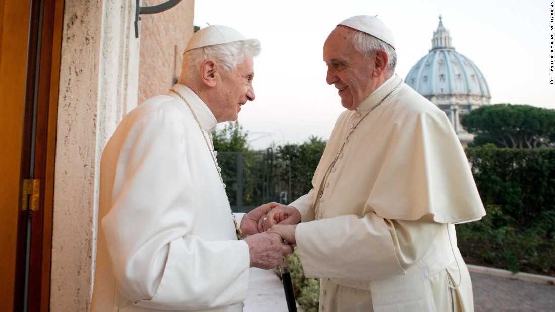 Pope Francis meets with Pope Emeritus Benedict XVI at the Vatican in December 2013. Benedict surprised the world by resigning &quot;because of advanced age.&quot; It was the first time a pope has stepped down in nearly 600 years.