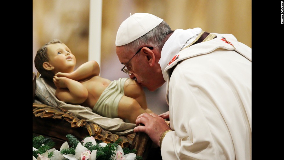 Pope Francis kisses a statue of baby Jesus. &quot;Our Father is patient. He loves us, he gives us Jesus to guide us on the way which leads to the promised land. Jesus is the light who brightened the darkness. Our Father forgives always. He is our peace and light.&quot;