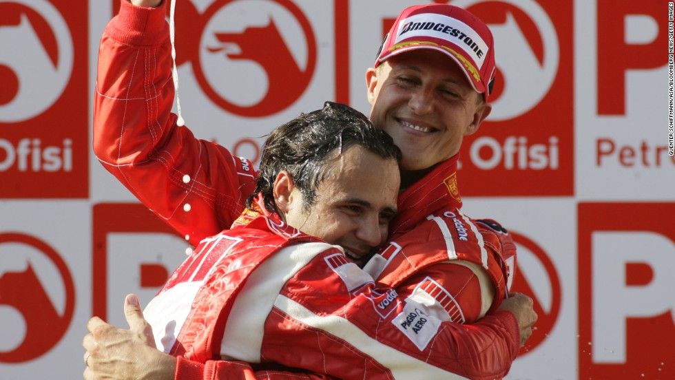 Felipe Massa hugs Schumacher after Massa won first place in the Formula 1 Grand Prix of Turkey in Istanbul in 2006.