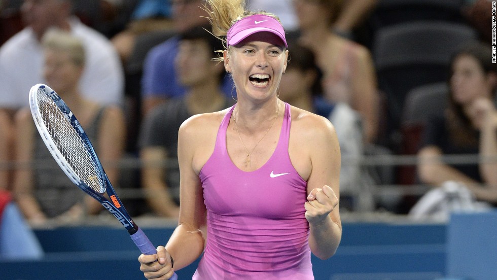 Maria Sharapova celebrates her comeback victory against Caroline Garcia of France during day two of the 2014 Brisbane International in Queensland.