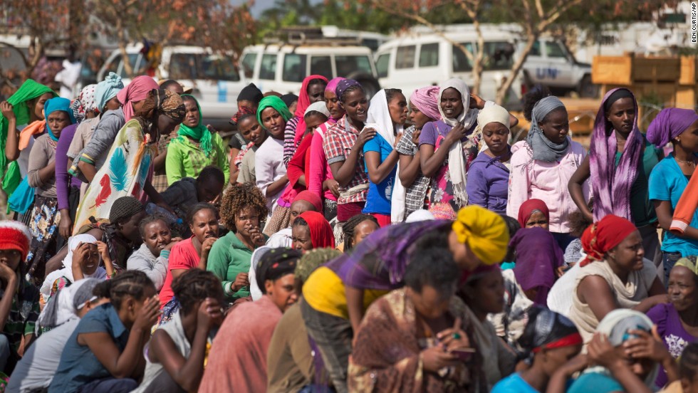 Displaced women wait in line inside a U.N. camp in Malakal on December 30. 