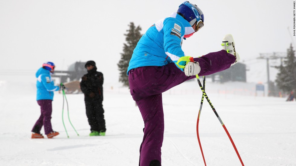 Vonn stretches her troublesome knee as she prepares for downhill training at Copper Mountain, Colorado, in November 2013.