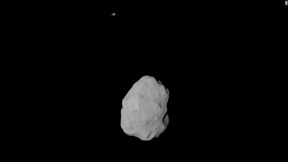 Look closely at the top of this picture. See that dot? That&#39;s Saturn. Rosetta snapped the picture of asteroid Lutetia and captured Saturn in the background.