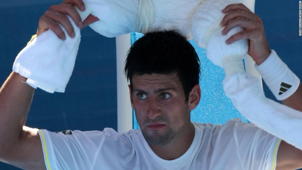 Djokovic used ice-soaked towels in an attempt to cool down in the searing afternoon temperatures in Melbourne.